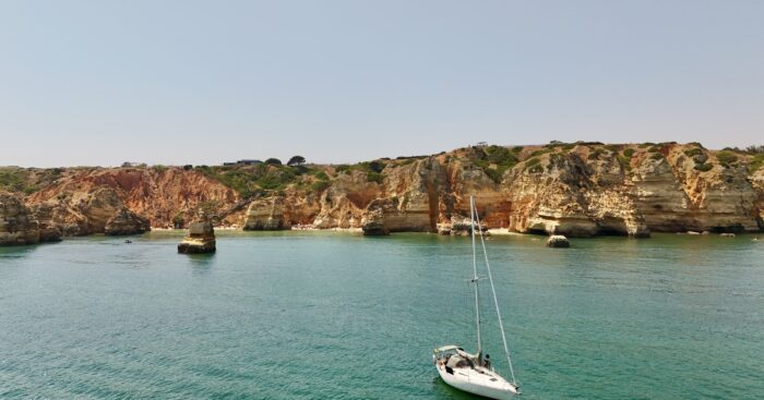 Sailing yacht off the Algarve coast of Portugal
