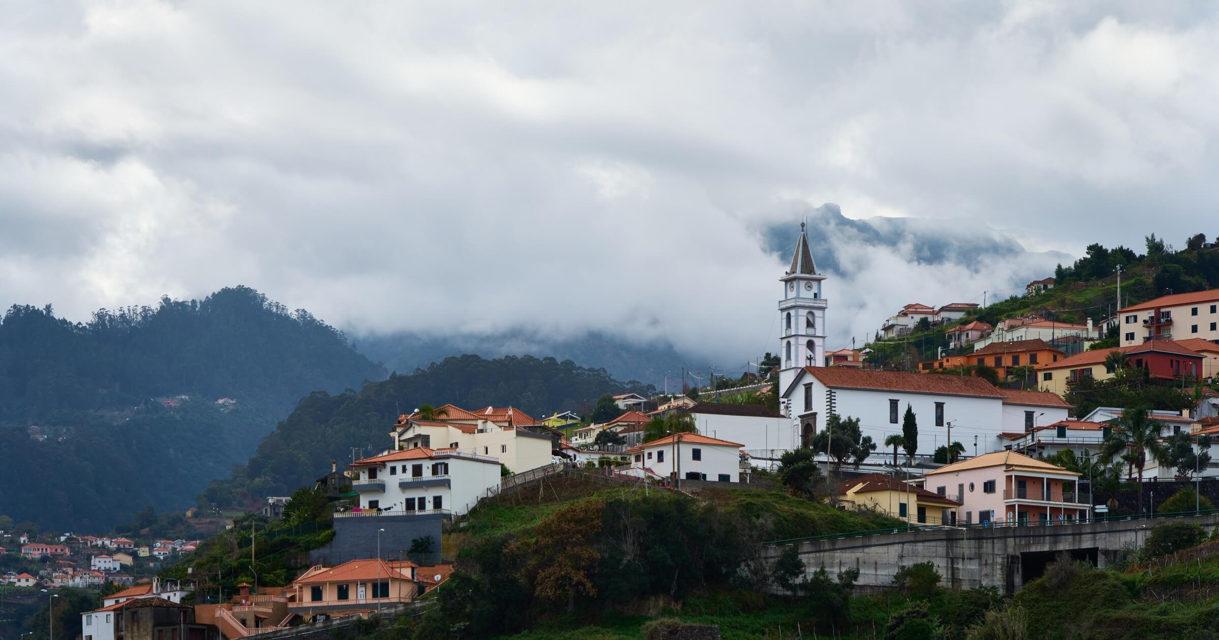 Village with church on a hillside in Madeira